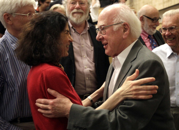 Real superstars: Peter Higgs congratulates ATLAS experiment spokesperson Fabiola Gianotti after she announced her collaboration's discovery of a Higgs-like particle (CERN/ATLAS/Getty) 