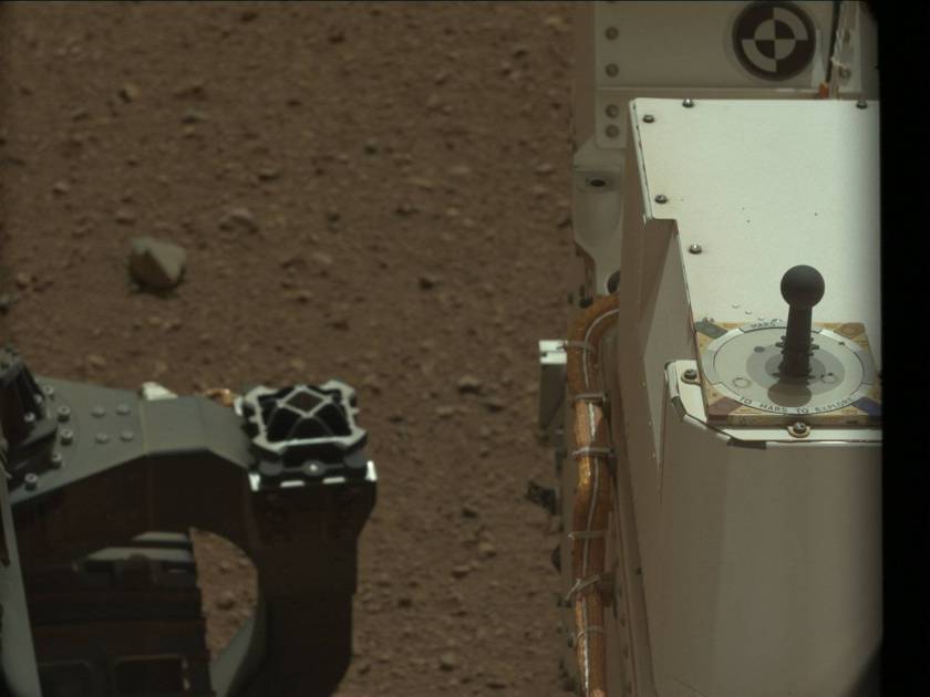 Curiosity's sundial on its deck reads: "Mars 2012 -- To Mars To Explore"