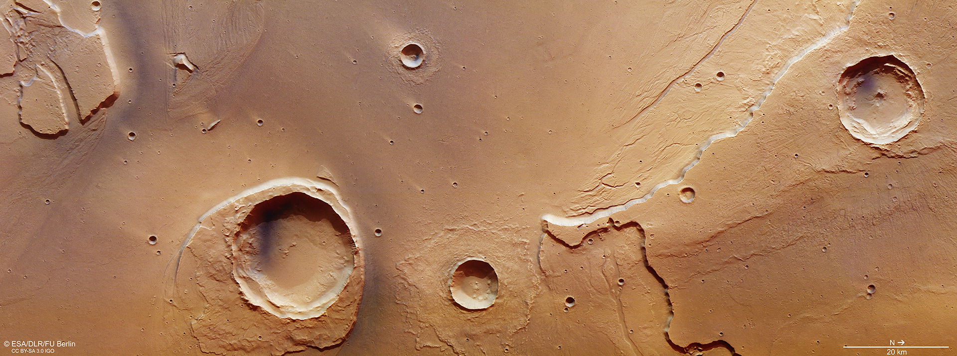 ESA Mars Express observation of the mouth of Kasei Valles, as it transitions into Chryse Planitia. The large crater in the lower left is Worcester Crater. (ESA/DLR/FU Berlin)